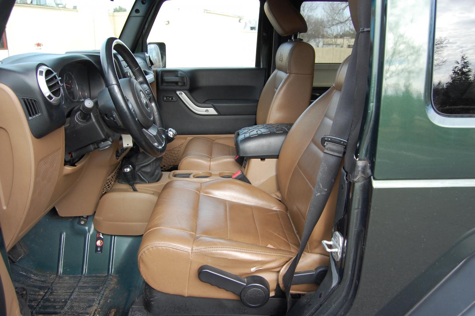 2011 Green /Tan leather Jeep Wrangler Sahara 4WD (1J4AA5D10BL) with an 3.8L V6 OHV 12V engine, 6 Speed Manual transmission, located at 6528 Lower York Road, New Hope, PA, 18938, (215) 862-9555, 40.358707, -74.977882 - Here we have a nice running and driving Jeep Wrangler with a 3.8L V6 putting power to a 4x4 manual transmission. Options include Tan leather, AC, heat, heated front seats, power windows/locks/mirrors, AM/FM/SAT/DISC/AUX radio, cruise control, tilt steering wheel, auto headlights, 3 piece removable h - Photo#11